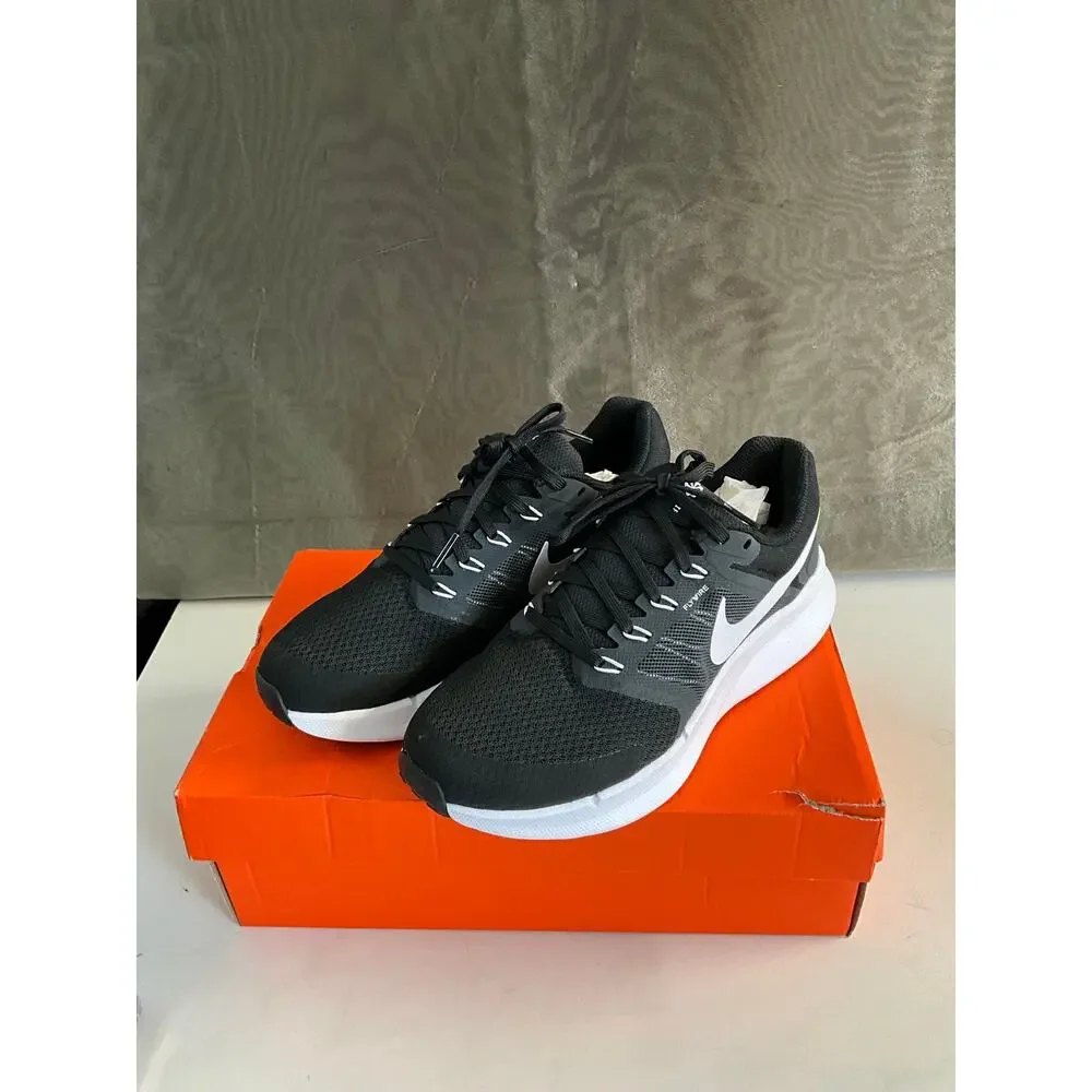 Nike Run Swift 3 sneakers in black and white